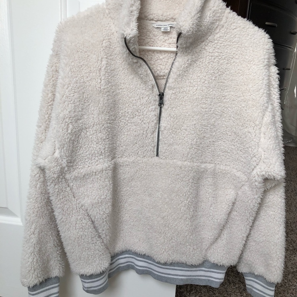 Cream Sherpa pullover with pockets